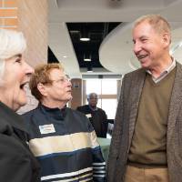 Lynn Blue laughing with President Emeritus Mark Murray at the Lynn M. Blue Connection Naming Ceremony